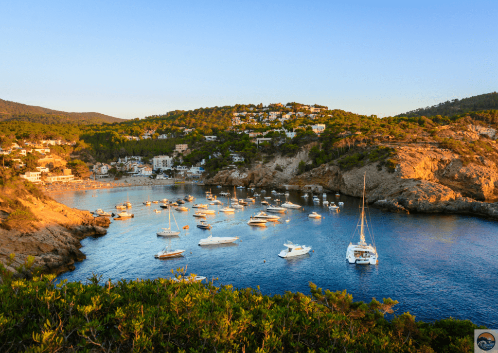 Sunset in the small bay of Cala Vedella, Ibiza island