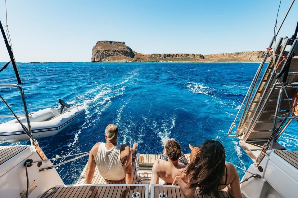 a group of people on a boat in the water