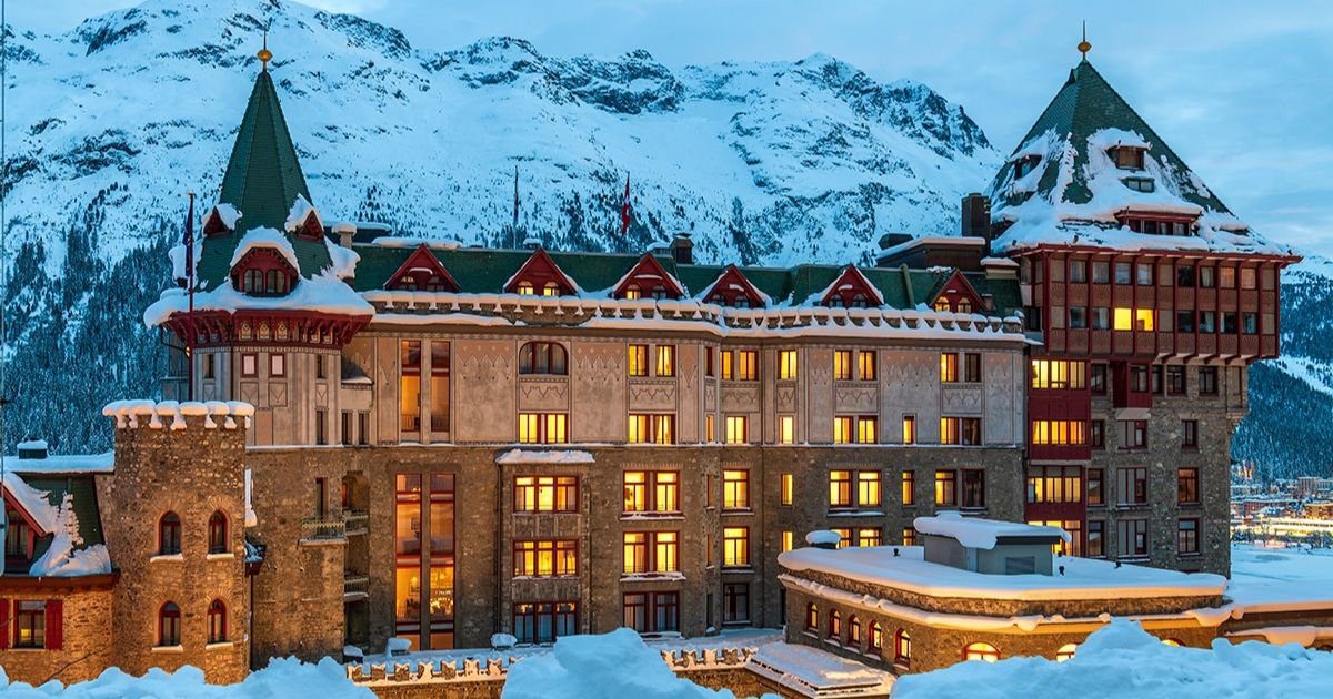 a building with snow on the top Best Hotels in Gstaad