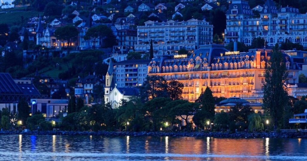 a large building next to a body of water